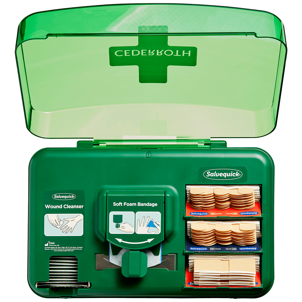 Dispenser Cederroth Wound Care med plåster, sårtvättare och Soft Foam Bandage för snabb och hygienisk sårrengöring.